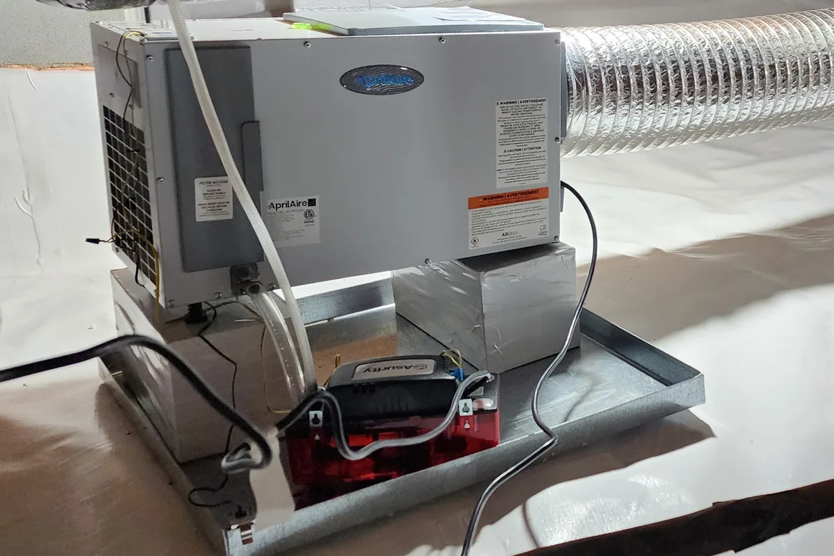 AprilAire crawl space dehumidifier installed in a Raleigh NC home
