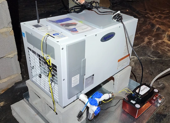 Professional crawl space dehumidifier unit installed in Raleigh, NC